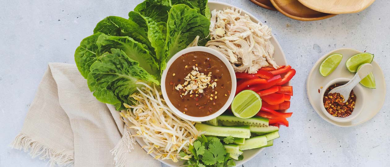 Shredded chicken lettuce cups with satay sauce