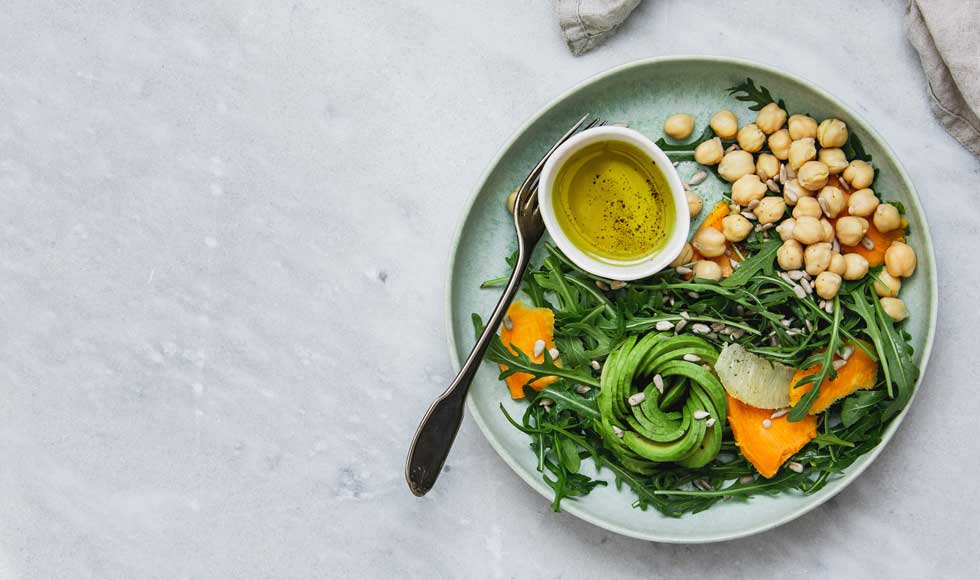 Plate of green vegetables and chickpeas